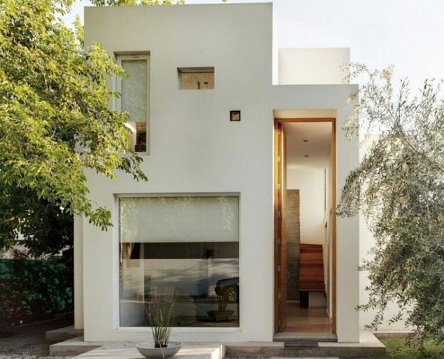 Minimalist 2-storey house in the form of a flat top cube Minimalist 2-storey house in the form of a flat top cube